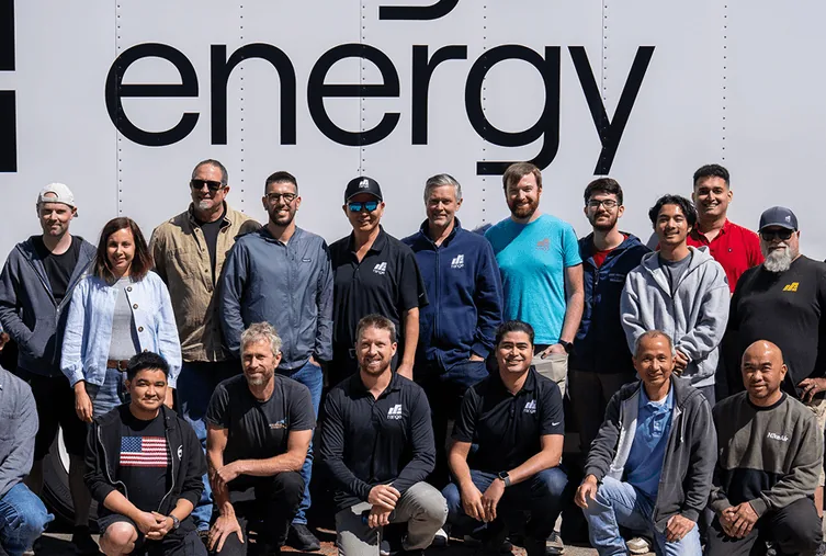 The Range Energy team in front of a Range trailer